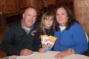 Joliet Police Detective Shawn Filipiak, Will County Juvenile Division Chief Tina Filipiak and their daughter Faith