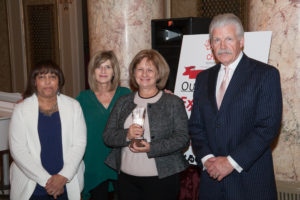 Staff of the Edward Hospital Care Center with Will County State's Attorney Jim Glasgow