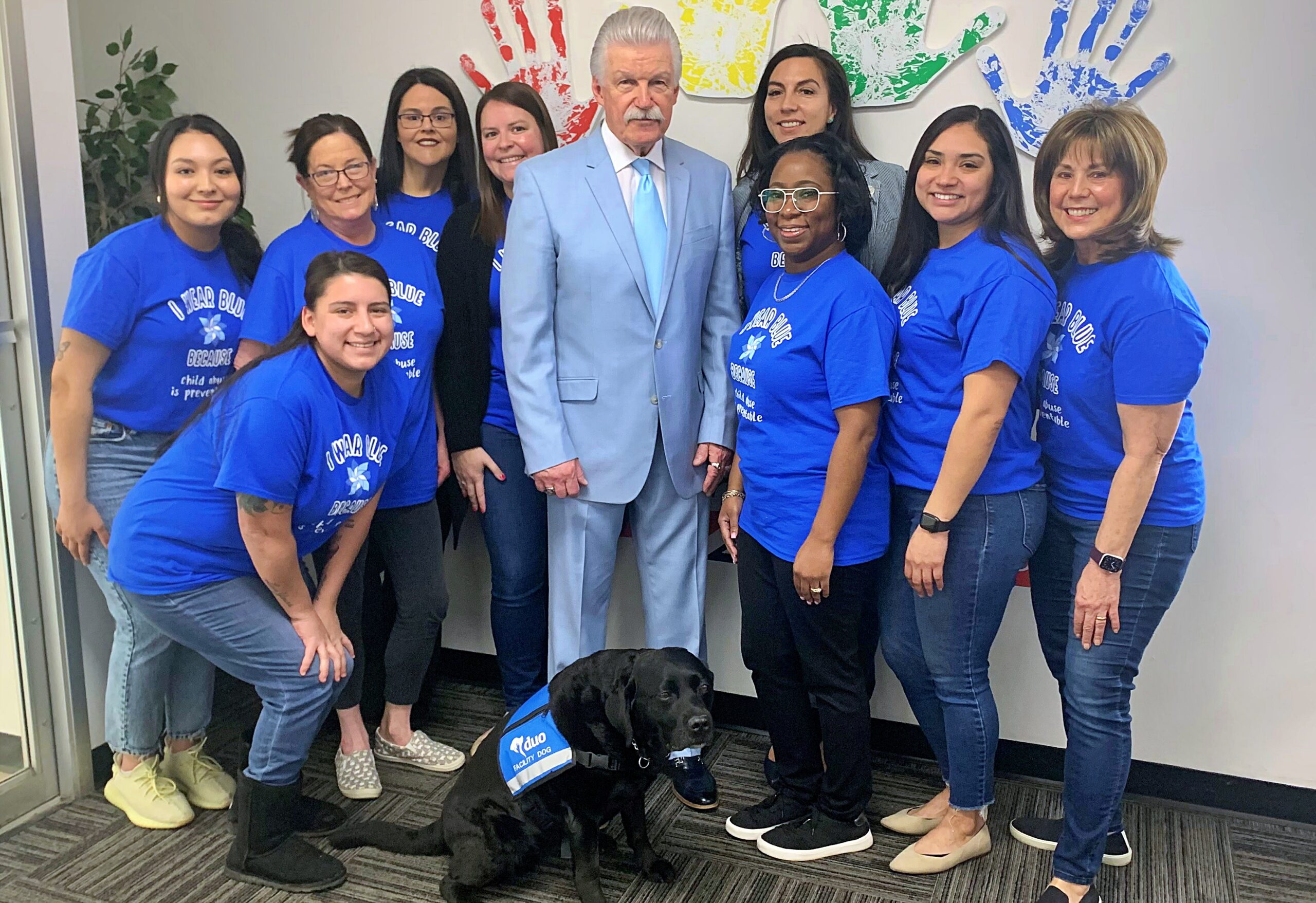 Will County CAC employees, dressed in “I Wear Blue Because Child Abuse is Preventable” t-shirts & facility dog Kiwi in her blue vest, in honor of #ChildAbusePreventionMonth, enjoyed a visit by our founder/board chair Will County State's Attorney Jim Glasgow -- also wearing blue! 💙
#NationalChildAbusePreventionMonth #ChildAbusePrevention